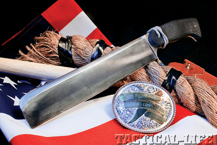 This is Sean Scott’s competition cutter, designed by knifemaker Steve Singer, shown alongside his World Championship buckle. Specially heat-treated CPM M4 steel was used for the blade.