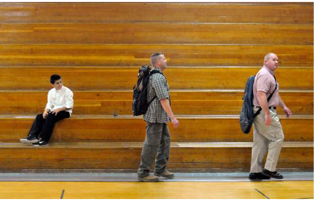 Off-Duty Guardian Angels Watch Over Colorado Schools