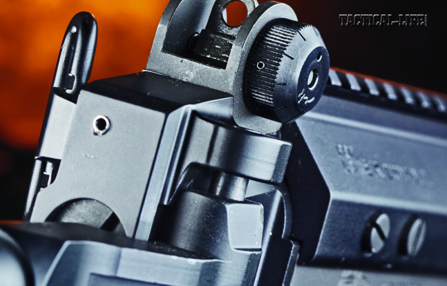 The steel, A2-style rear sight, with a side windage knob and two apertures for 150 and 250 yards, is mounted in a dovetail cut in the lower receiver.