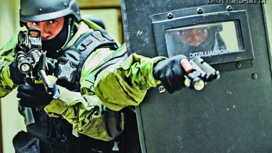 Fauquier County Sheriff’s Office SERT members practice tactical movement in a building’s tight confines. Because of the county’s makeup, SERT must handle both urban and rural scenarios.
