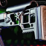 The skeletonized, folding stock locks over the bolt handle to keep it secure and reduce the MRAD’s width.