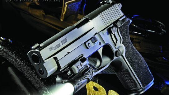 The new Sig Sauer P227 Nitron carries 10+1 rounds of .45 ACP firepower in a tank-tough package. Shown with a Crimson Trace CMR-202 Rail Master light.