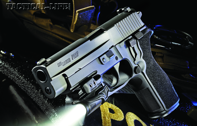 The new Sig Sauer P227 Nitron carries 10+1 rounds of .45 ACP firepower in a tank-tough package. Shown with a Crimson Trace CMR-202 Rail Master light.