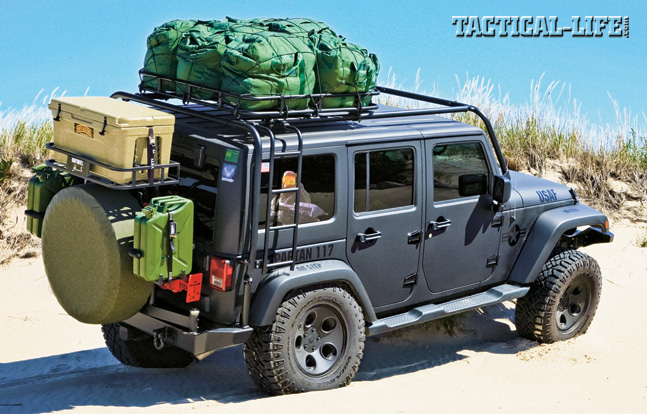 A 2012 four-door Jeep Wrangler JK Sahara with a 3.6-liter Pentastar V6 engine, tricked-out for tactical operations, hits the beach fully loaded and prepared for the worst.