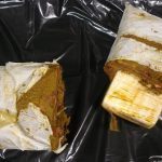 7.35 pounds of cocaine was found inside frozen meat that a passenger allegedly had in his luggage.