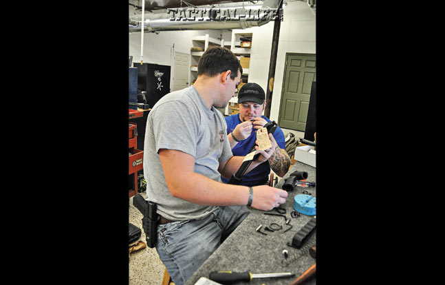 Stumpies Custom Guns owners Johnny Morris (left) and Brad Lang (right) hard at work in their newly opened, full-service gunshop in Swansboro, NC. 