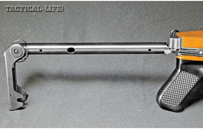 The AC-556 utilizes a skeletonized stock that locks solidly into place, folds to the right side and has a slim, fold-down buttplate. Also note the sling swivel mounted at the rear left corner of the receiver.