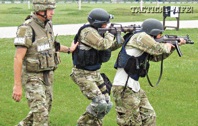 The RPD’s SWAT team stays sharp and always ready. Here the team practices move-and-shoot drills at Camp Perry, Ohio.