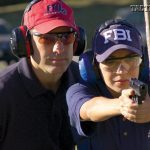 At the FBI Academy is Quantico, Virginia, agents and cadets are taught how to master their .40 caliber Glock pistols from several shooting positions, including from behind cover. Glocks are easy to use and maintain, and have a stellar reputation for reliability.