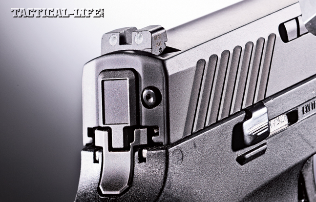 The P320 is a hammerless design that features a striker-fired system in its place. Note the SIGLITE night sights.
