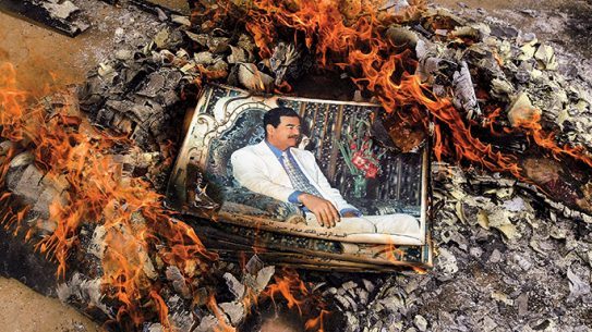 Images of Saddam Hussein were being destroyed across Iraq.