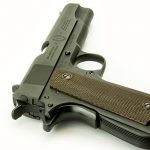 Inland M1 Carbine and 1911a1 handgun rear