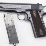 us army surplus m1911 pistol left profile with magazine