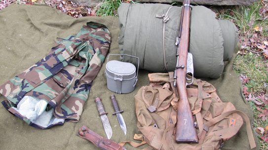 Army Surplus, knives, rifle, clothing, sleeping bag