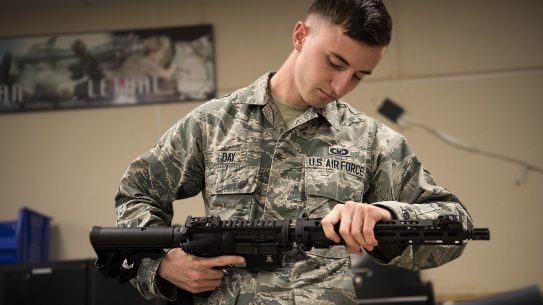 Airman First Class Zack Day, 366th Operation Support Squadron aircrew flight equipment apprentice, assembles a GUA-5A May 6, 2019, at Mountain Home Air Force Base, Idaho. The GUA-5A is a part of the ACES II survival kit that is provided for every aircrew member in the event they must eject into hostile territory. The weapon is easily assembled without tools and provides semi-automatic capabilities.