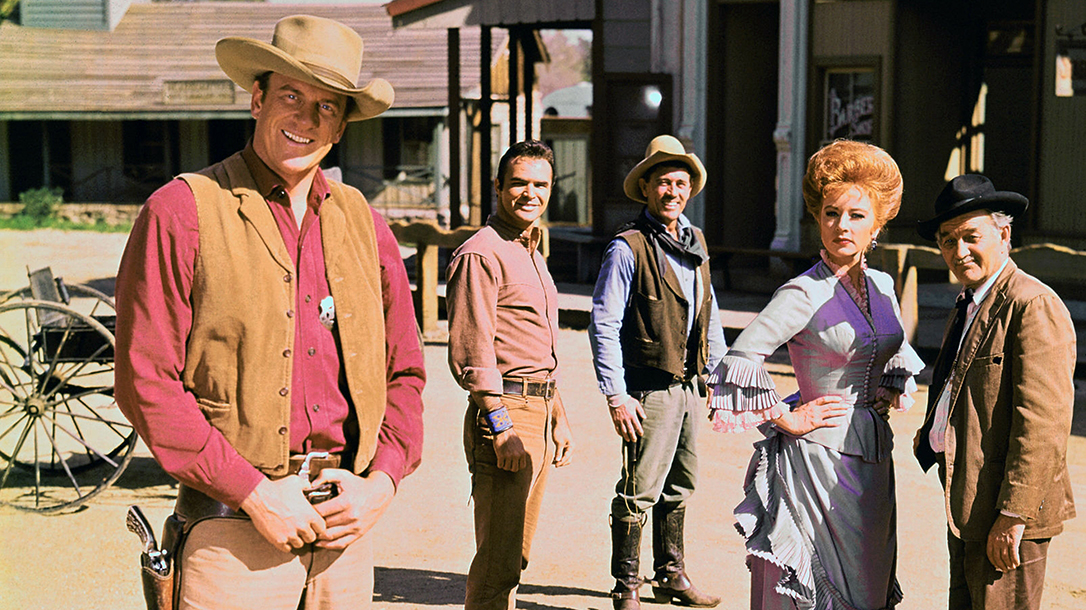 Cast members of Gunsmoke including (left to right) James Arness as Marshal ...