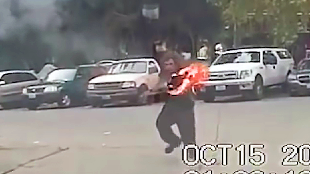 A suspect attacked a Seattle police officer with a giant torch.