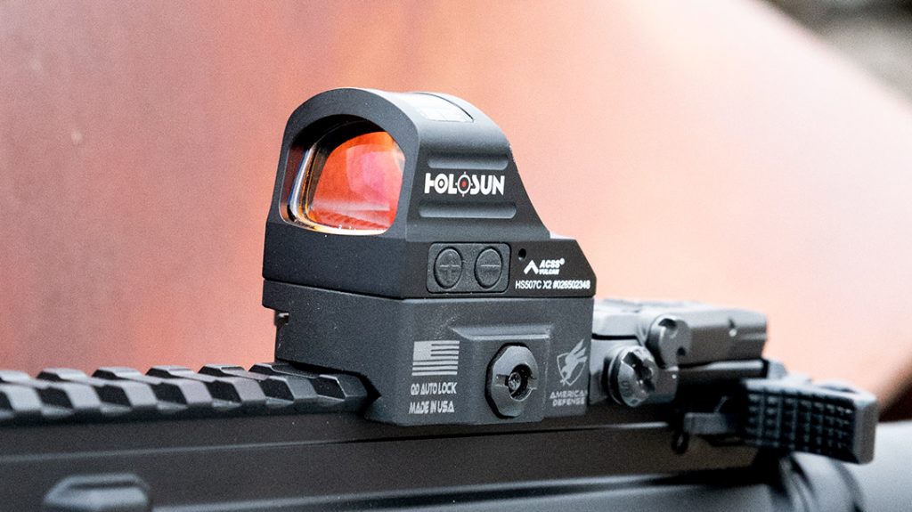 The AR pistol build includes the Holosun HS507C-X2 with ACSS Vulcan Reticle.