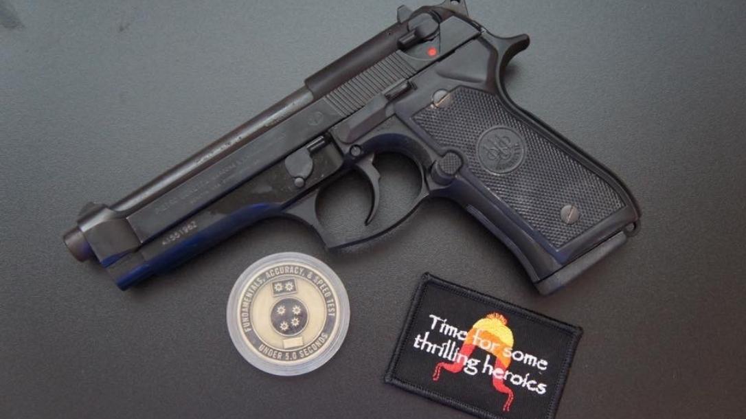 Caleb Giddings FAST Coin and his Beretta 92FS