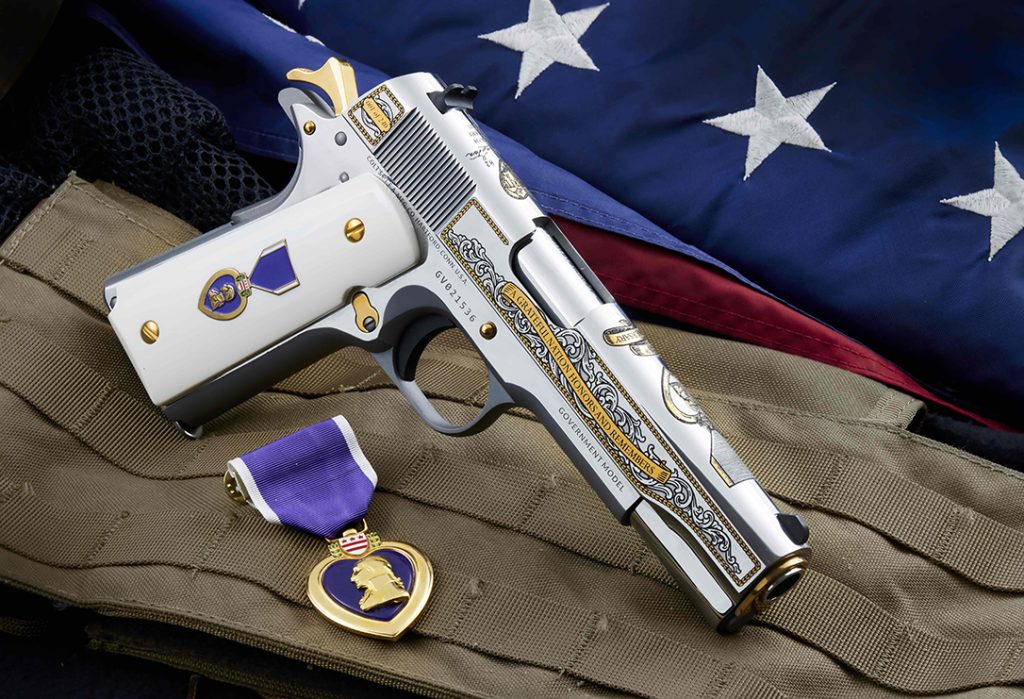 Scroll work and engraving highlight the Purple Heart 1911. 