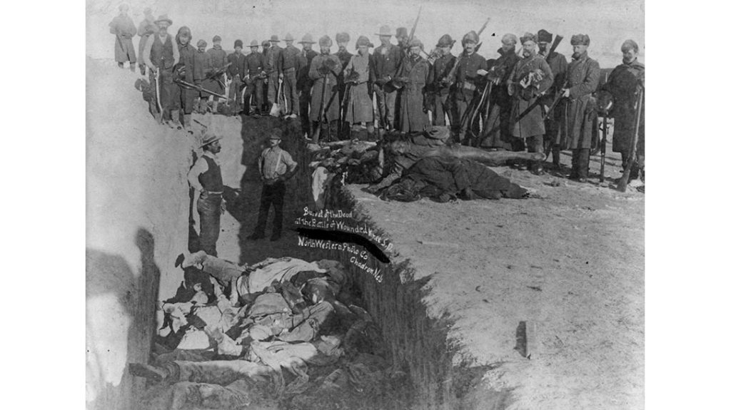 The bodies of the dead were buried in a mass grave at the site of the Wounded Knee Massacre.