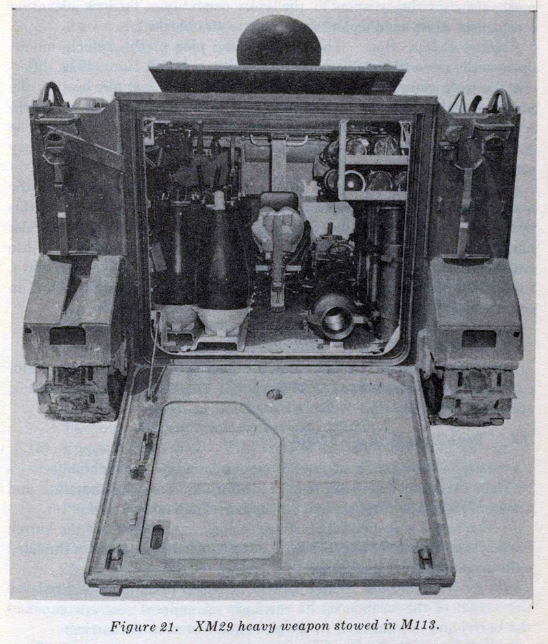 The M29 heavy version is shown broken down for transport in an armored personnel carrier.