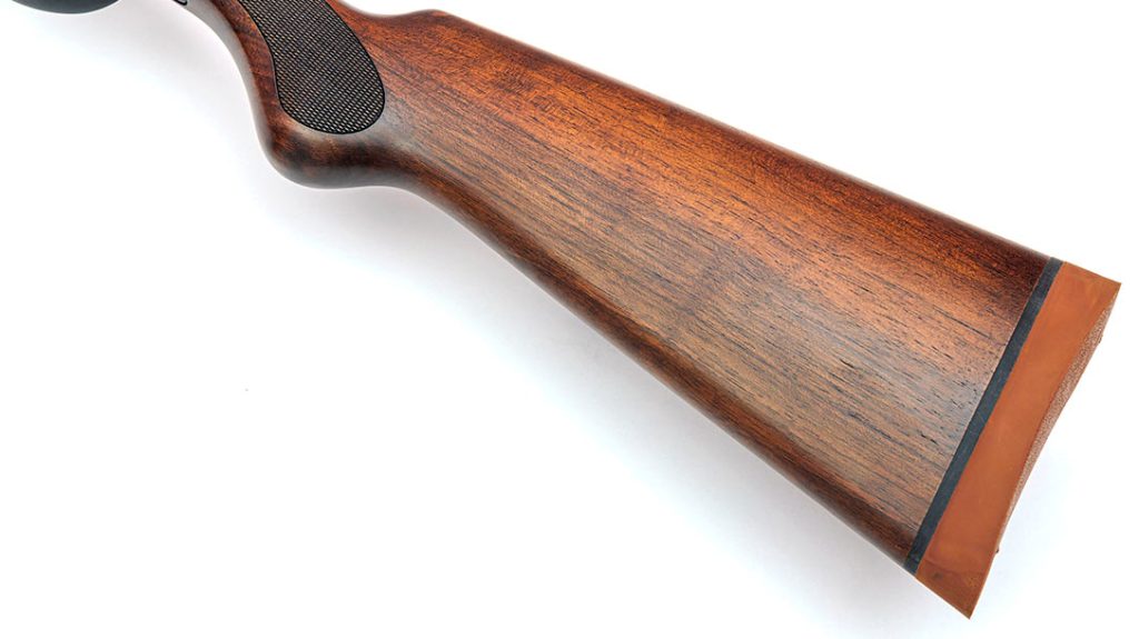 The stocks are made from oil-finished walnut and have a checkered Prince-of-Wales pistol grip and burnt orange recoil pad with a black spacer.